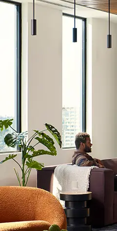 Man sitting on a sofa.