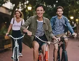 young women riding a bike